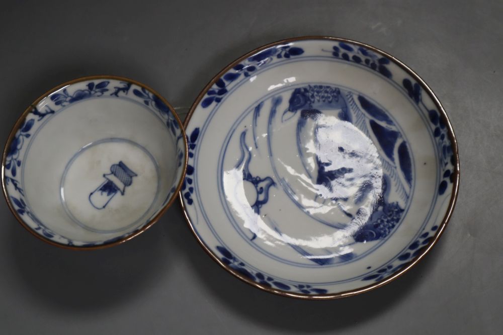 A Chinese Kangxi blue and white leaping carp tea bowl and saucer, 13cm diameter